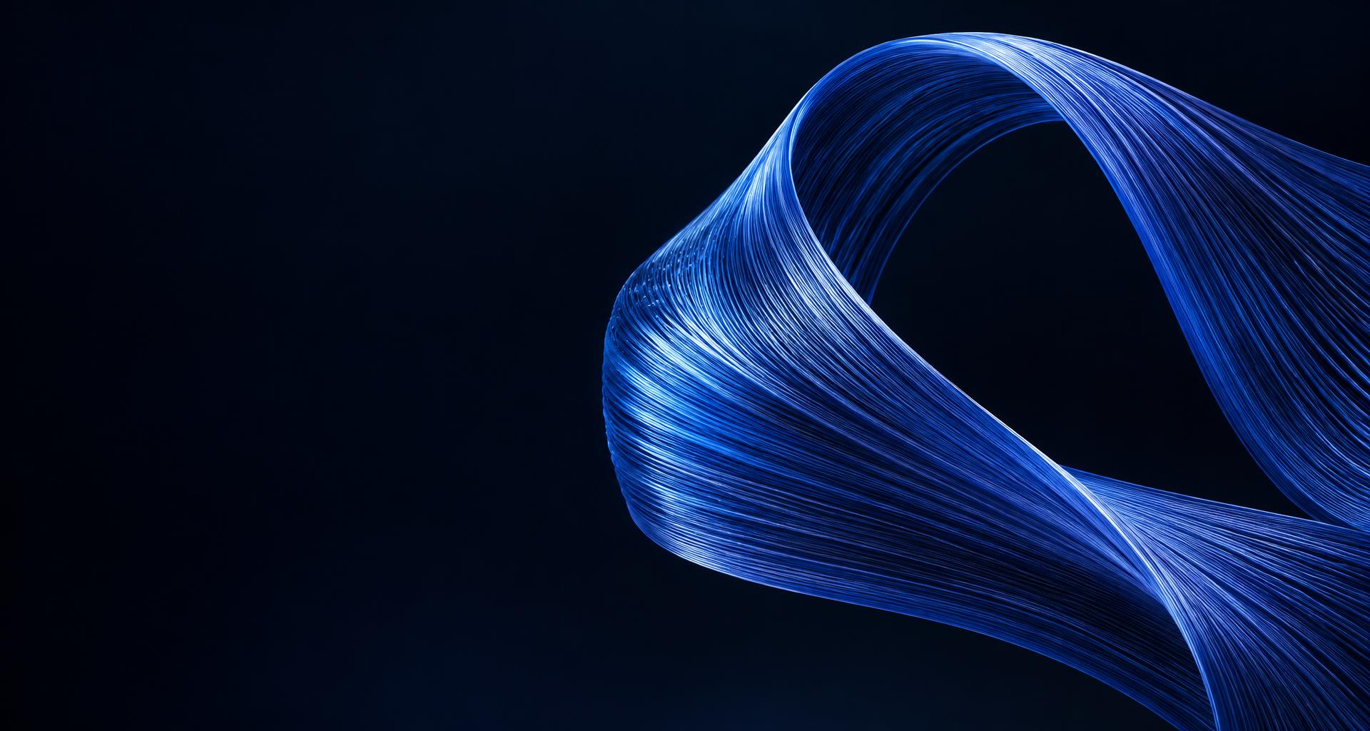 A flowing ribbon of fine blue threads, woven into one continuous form